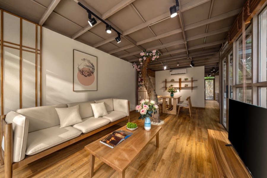 Looking through from the living room to the dining table — living room at Fuka House, Da Nang
