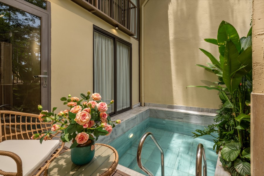 The pool by the bedroom doors, in the afternoon — pool at Fuka House, Da Nang